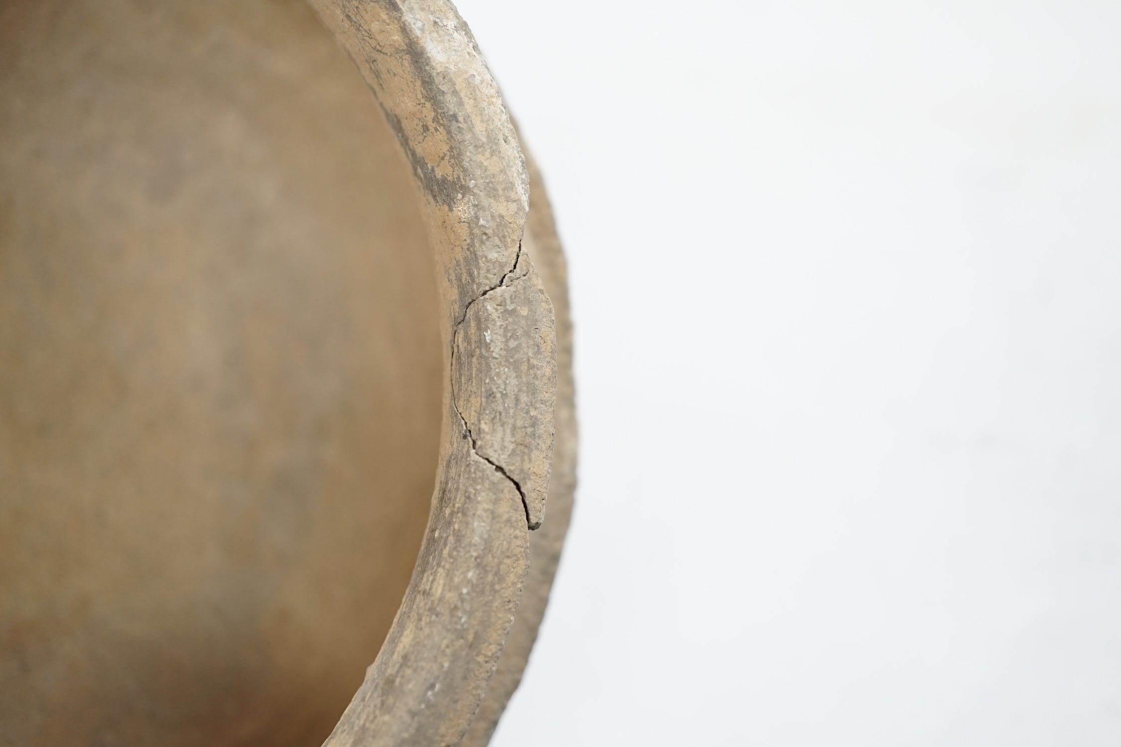 A Chinese grey pottery bowl, probably Warring States, 19cm diameter